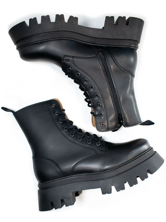 Track Sole 8-Eye Lace Up Boots in Black