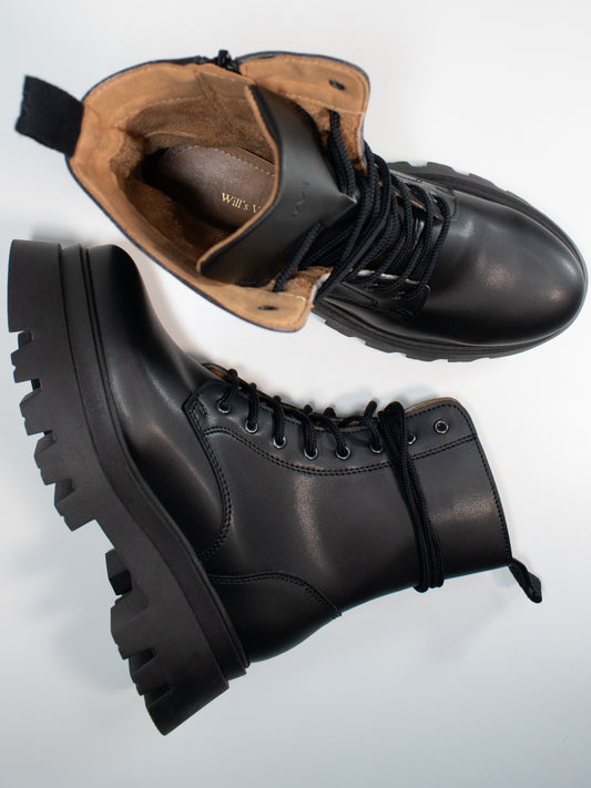 Track Sole 8-Eye Lace Up Boots in Black