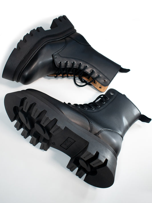 Track Sole 8-Eye Lace Up Boots in Black